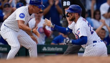 Busch stars as the Cubs beat the Cardinals 7-3 to clinch the top NL wild card
