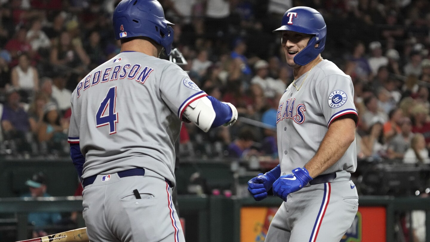Osuna's 2-run single in 10th inning pushes Rangers past Diamondbacks 7-5 for 6th straight win