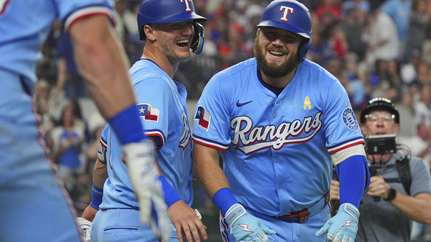 Burger and Jung get to Valdez as Rangers beat Astros 4-2 to keep pace in AL wild card