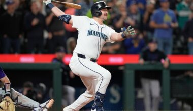 Cal Raleigh hits MLB-leading 59th and 60th homers to help the Mariners wrap up AL West