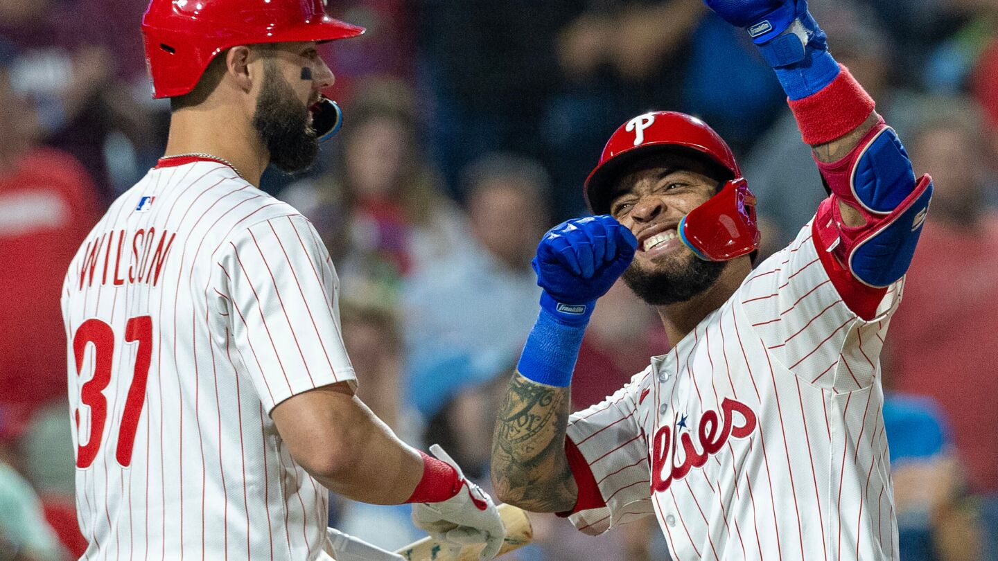 Phillies wrap up a 1st-round bye, hitting a team-record 8 homers to rout the Marlins