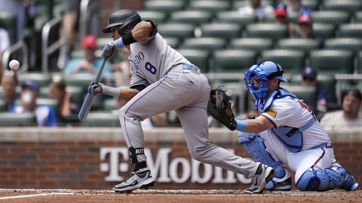McMahon hits go-ahead homer in 7th as Rockies beat Holmes and Braves 10-1