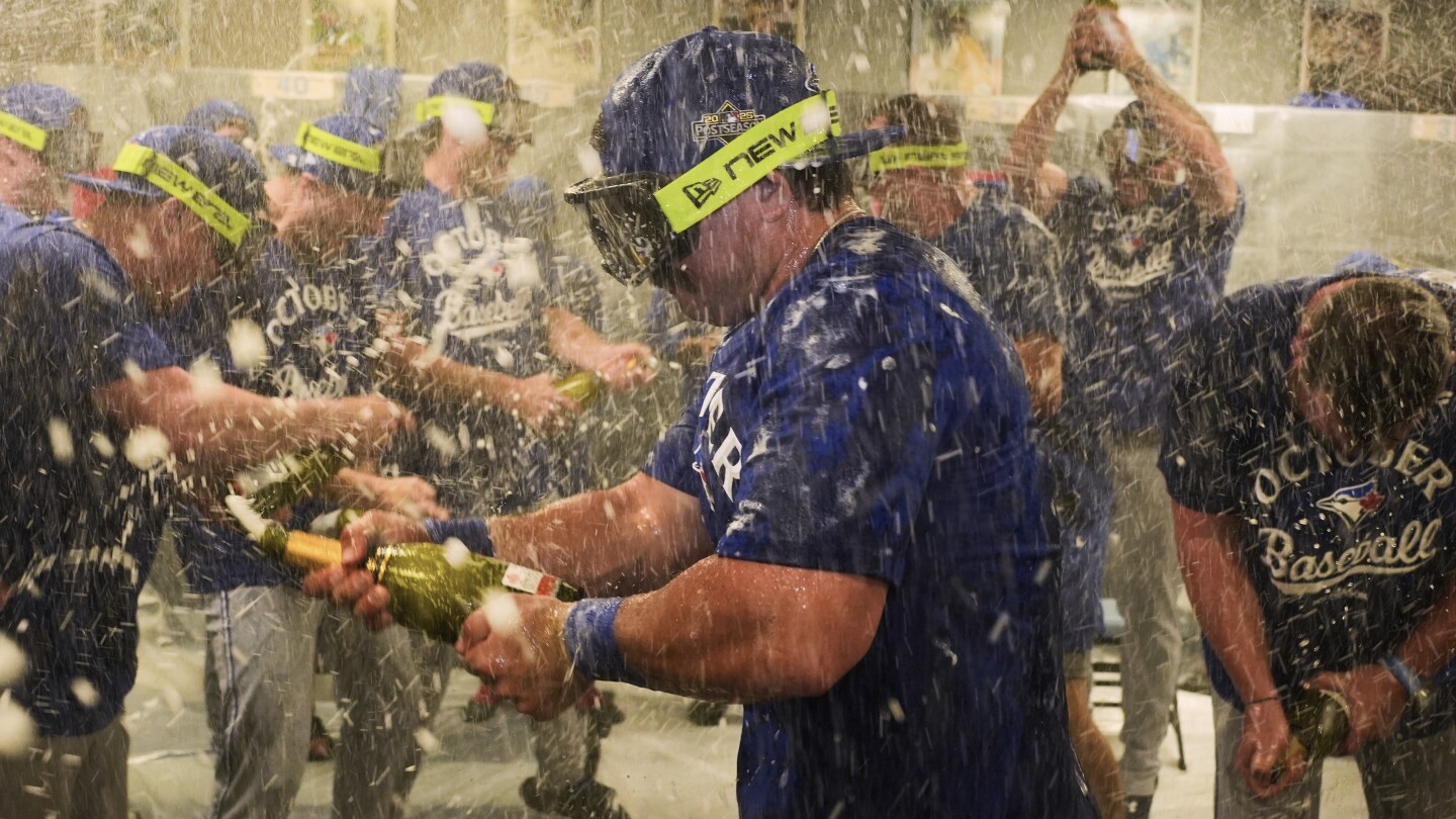 AL East-leading Blue Jays head to postseason after Royals victory