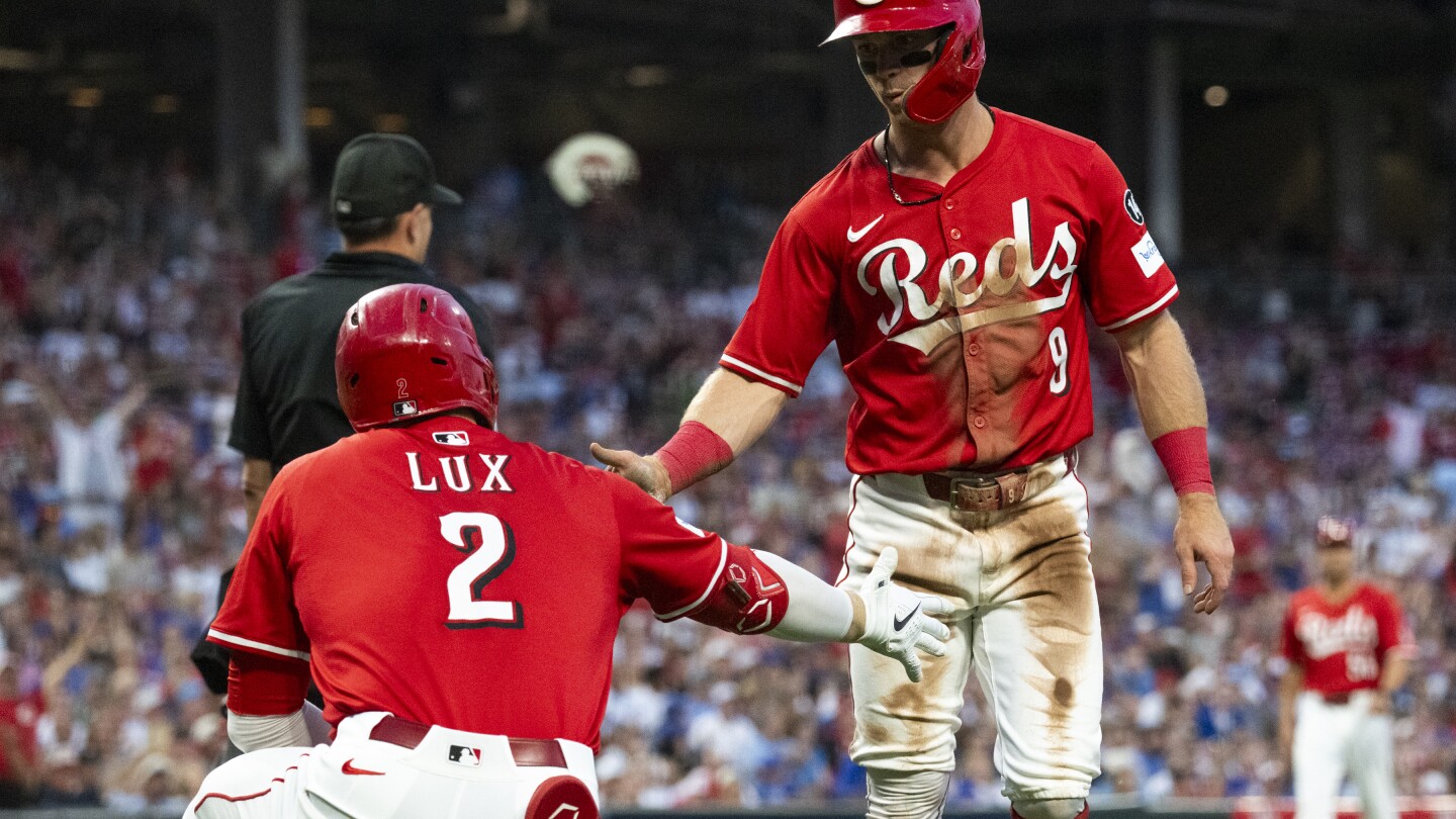 Steer's 4th homer in 4 games powers Reds past Cubs 6-3 and within 1 game of final NL wild-card spot