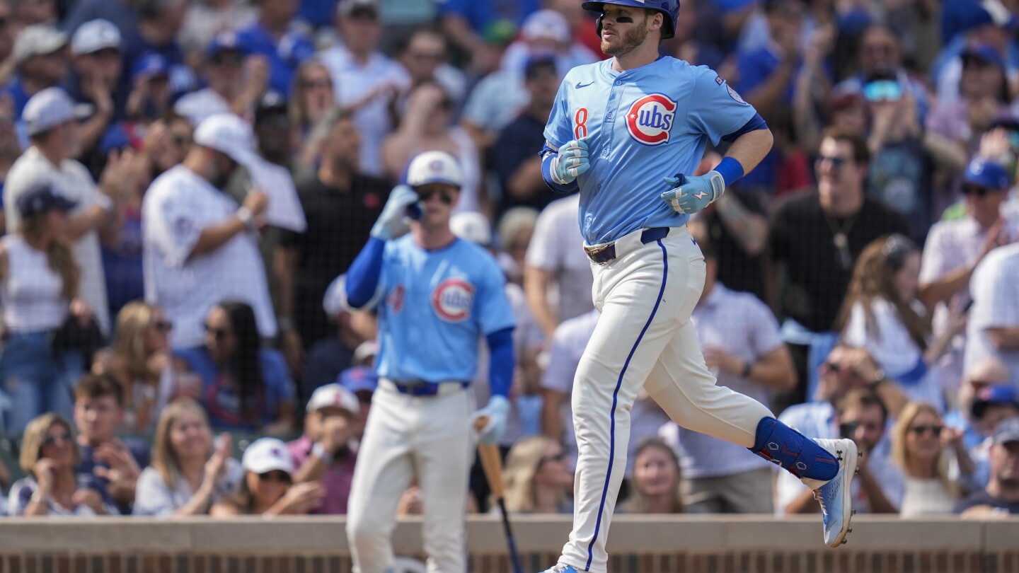 Happ homers as the Cubs beat the slumping Rays 6-4