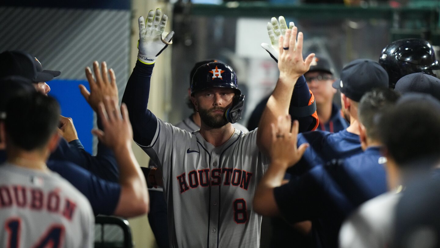 Walker hits 2 homers as Astros beat Angels 6-1 after getting knocked out of playoff contention