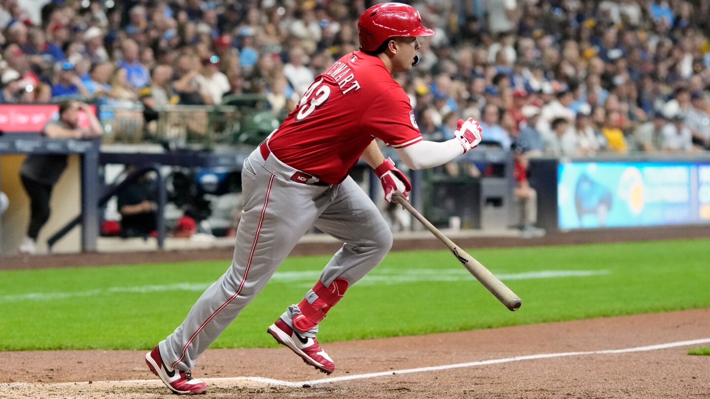 Reds beat Brewers 7-4 to move a step closer to playoffs