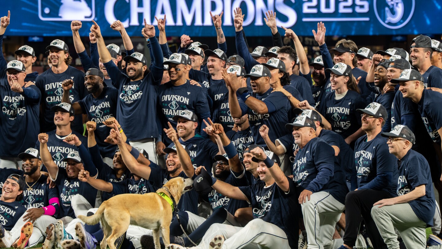 Mariners win AL West for 1st time in 24 years as Cal Raleigh reaches 60 homers in 9-2 win over Rockies