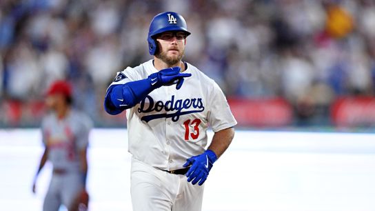 Los Angeles Dodgers third baseman Max Muncy (13) hits a two run home run during the third inning against the St. Louis Cardinals at Dodger Stadium. Los Angeles Dodgers third baseman Max Muncy (13) hits a two run home run during the third inning against the St. Louis Cardinals at Dodger Stadium.