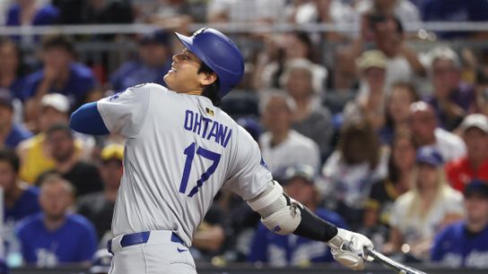 Los Angeles Dodgers two-way player Shohei Ohtani (17) hits an infield single against the Pittsburgh Pirates during the seventh inning at PNC Park. Los Angeles Dodgers two-way player Shohei Ohtani (17) hits an infield single against the Pittsburgh Pirates during the seventh inning at PNC Park.