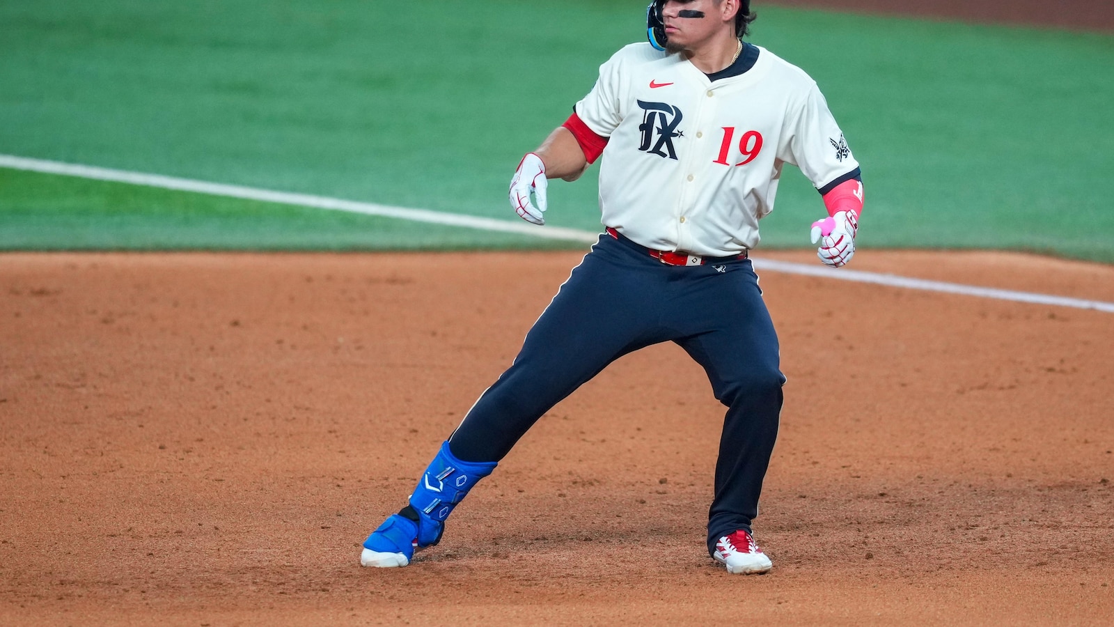 Marlins beat slumping Rangers 6-4 in 12 innings for fourth straight win