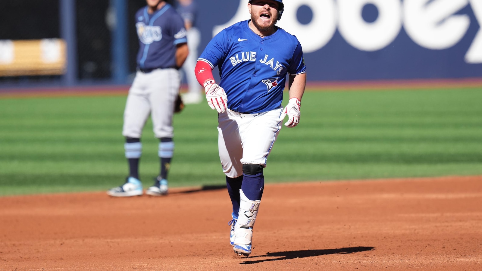 Kirk hits two homers as Blue Jays rout Rays 13-4 to clinch AL East title