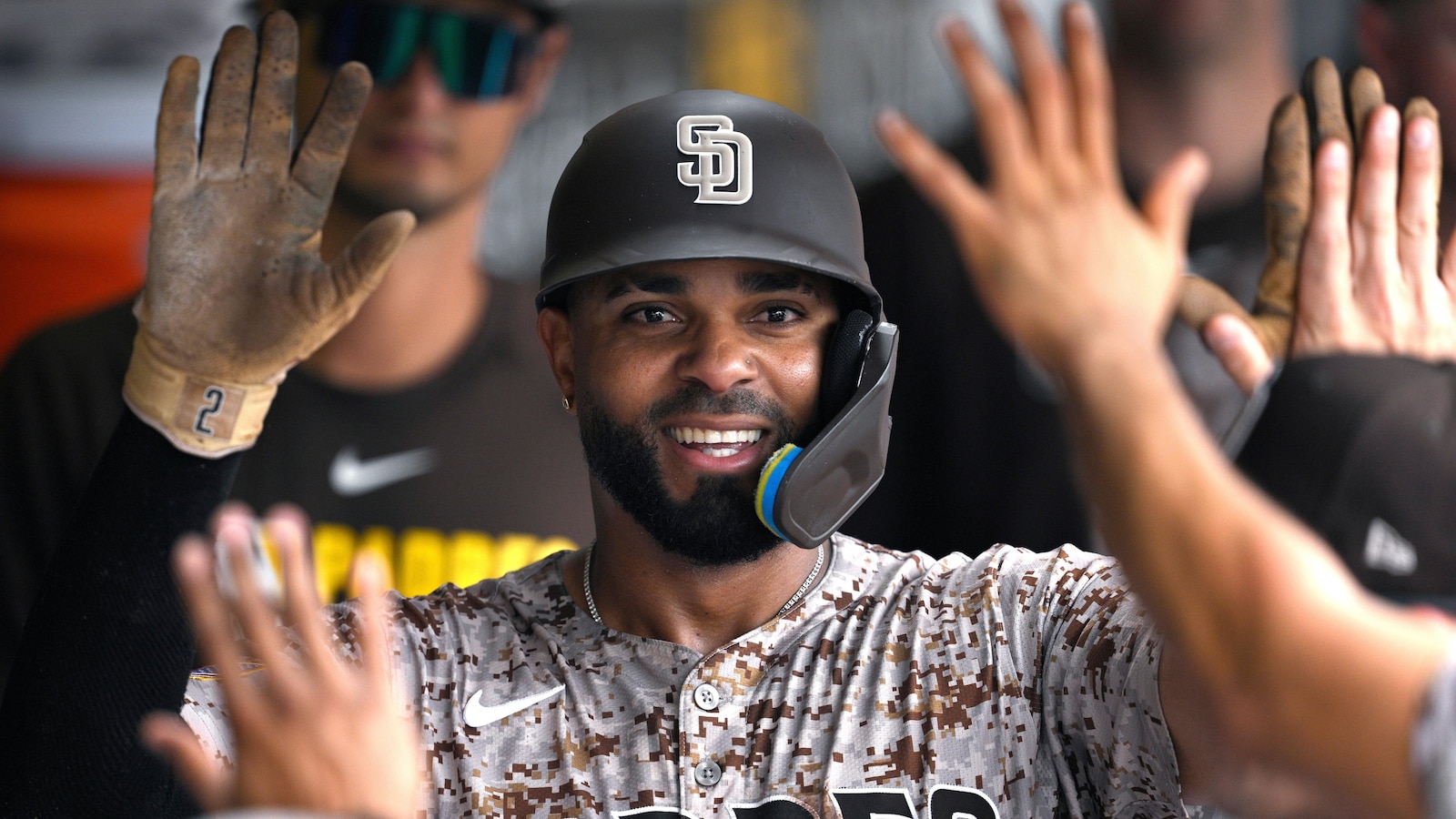 Machado, Padres head into postseason after beating Diamondbacks 12-4 for 3-game sweep