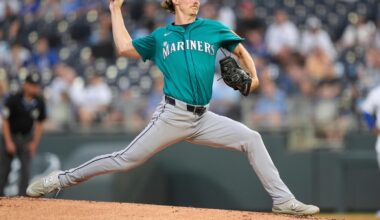 Royals score four in the eighth to snap Seattle's 10-game winning streak