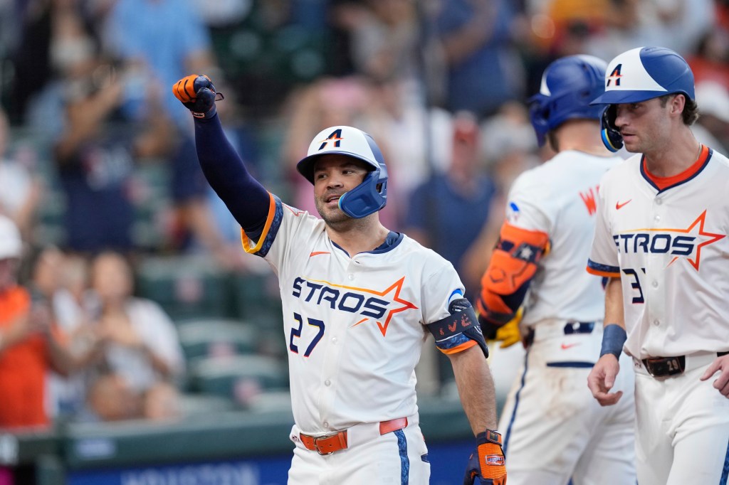Houston Astros baseball player celebrating.