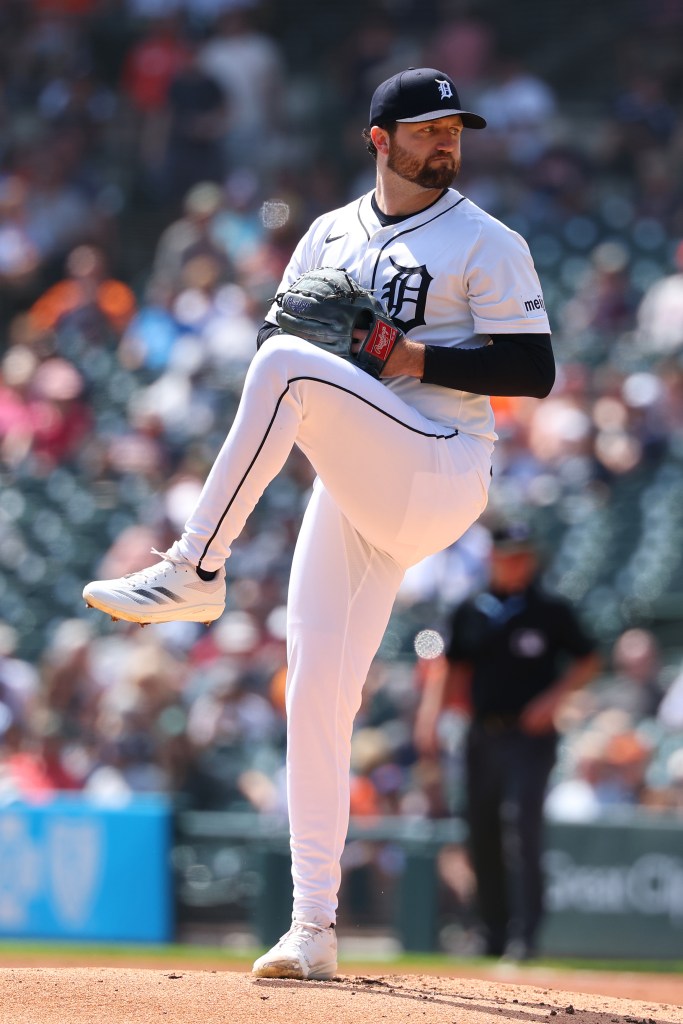 Detroit Tigers pitcher winding up to pitch.