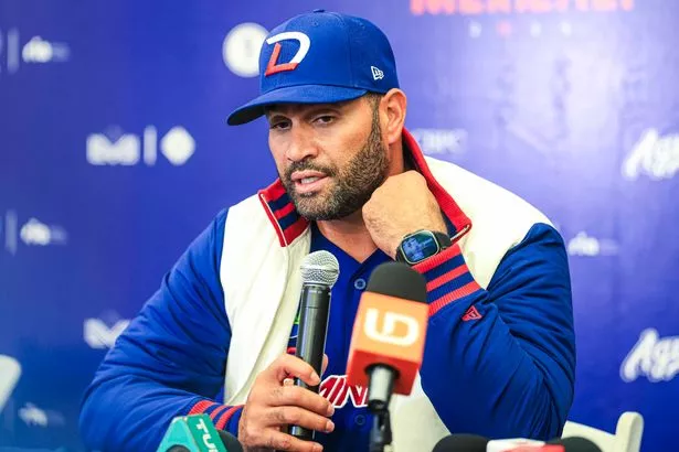 Albert Pujols attends a press conference and speaks