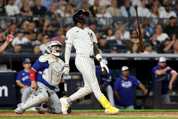 Jazz Chisholm Jr. flips his bat after crushing a go-ahead home run in Game 3 of the ALDS against the Toronto Blue Jays