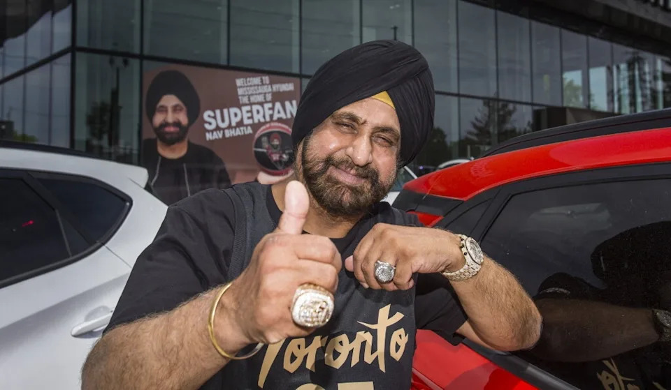  Toronto Raptors Superfan Nav Bhatia with his 2019 championship ring (left) and his hall of fame ring at his Mississauga Hyundai dealership in Mississauga, Ont. on Wednesday, June 2, 2021.