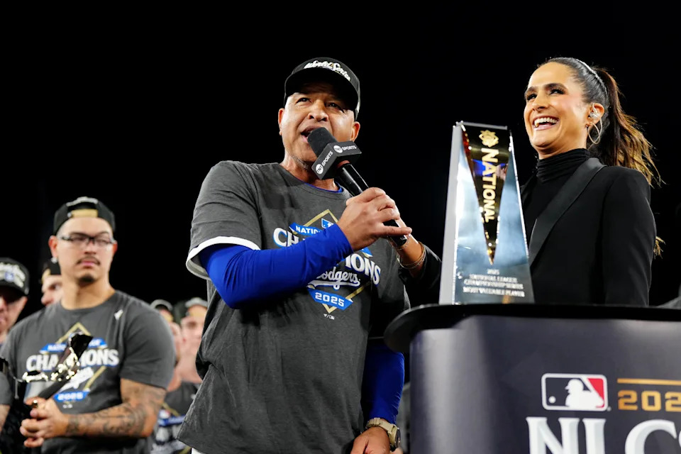 LOS ANGELES, CA - OCTOBER 17: Manager Dave Roberts #30 of the Los Angeles Dodgers talks with Lauren Shehadi after the Dodgers defeated the Milwaukee Brewers in Game Four of the National League Championship Series presented by loanDepot to advance to the World Series at Dodger Stadium on Friday, October 17, 2025 in Los Angeles, California. (Photo by Mary DeCicco/MLB Photos via Getty Images)