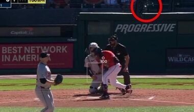 A pitch fouled backwards by a Guardians player shattered the glass on a camera lens Tuesday