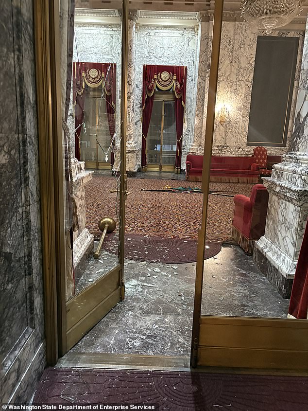 The 29-year-old is also suspected of smashing the glass door to the State Reception Room
