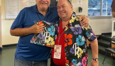 Heist (right) is seen with the Associated Press' David Ginsburg (left) in Baltimore