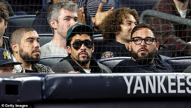 The musician caused outrage by sitting for 'God Bless America' during Tuesday's game