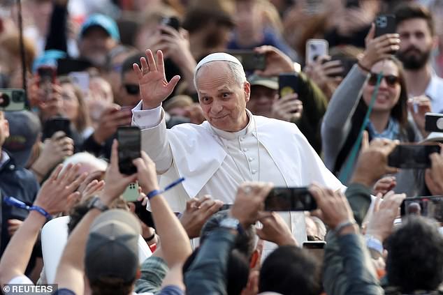 Pope Leo XIV gestures on the day of a general audience in Saint Peter's Square at the Vatican