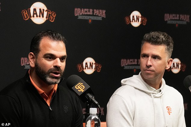 San Francisco Giants general manager Zack Minasian, left, speaks next to president of baseball operations Buster Posey during a press conference earlier this month