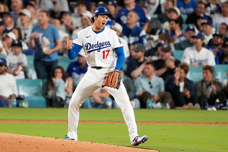 AP photo by Mark J. Terrill / Los Angeles Dodgers pitcher Shohei Ohtani celebrates at the end of the top of the third inning during Game 4 of the NL Championship Series against the visiting Milwaukee Brewers on Friday night.