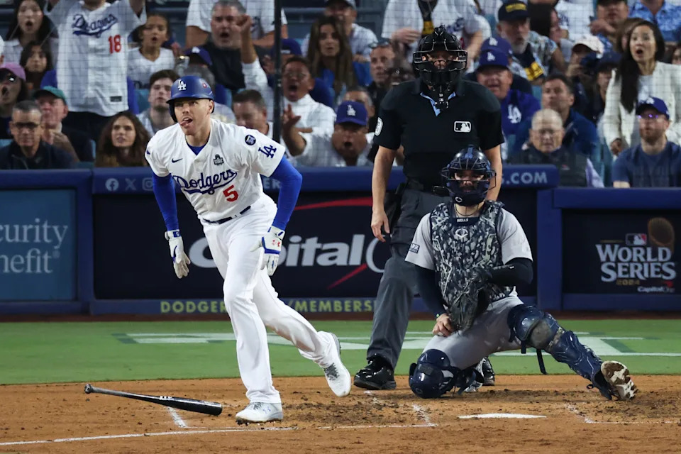 LOS ANGELES, CALIFORNIA - OCTOBER 26: Freddie Freeman #5 of the Los Angeles Dodgers runs after hitting a home run off Carlos RodÃ³n (not pictured) #55 of the New York Yankees in the third inning during Game Two of the 2024 World Series at Dodger Stadium on October 26, 2024 in Los Angeles, California. (Photo by Steph Chambers/Getty Images)
