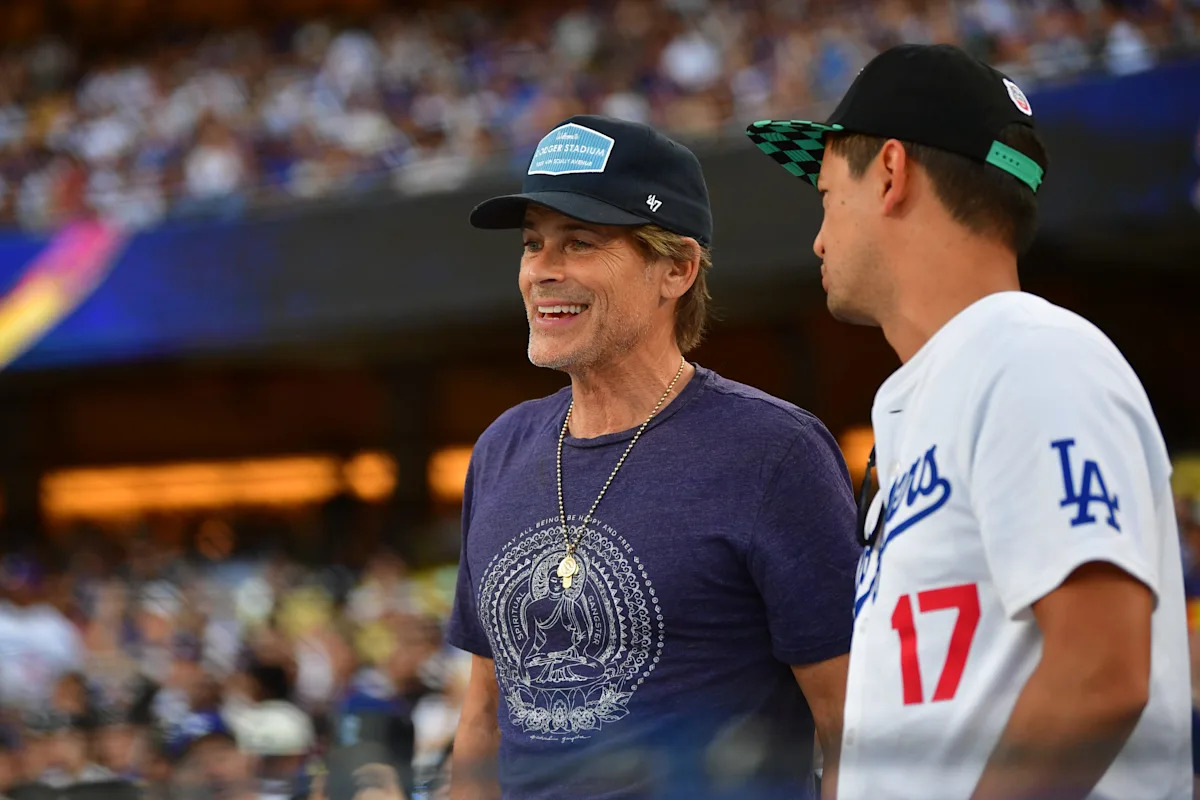 Rob Lowe infuriates Reds fans with his treacherous hat choice