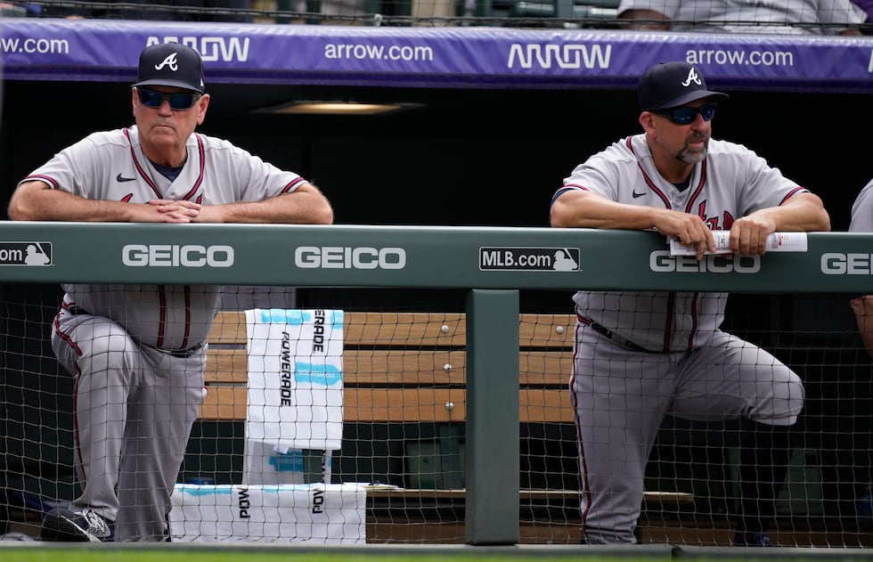 Atlanta Braves manager Brian Snitker (43) and Atlanta Braves bench coach Walt Weiss (4) in the...