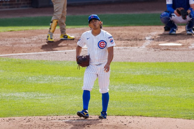 Chicago Cubs pitcher Shota Imanaga (18) walks on the mound...