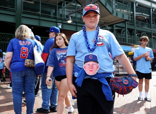 Pete Crow-Armstrong fan Gabe Carver, 12, of Marion, stands outside...