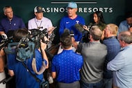 Texas Rangers manager Bruce Bochy talks with reporters before an exhibition baseball game...