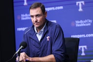 Texas Rangers General Manager Chris Young listens during a post season press conference, on...