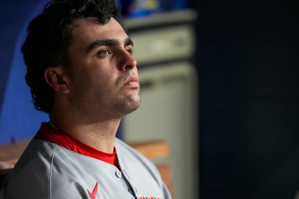Cincinnati Reds' Sal Stewart sits in the dugout after the ninth inning of the MLB National League Wild Card Game 2 between the Los Angeles Dodgers and Reds.