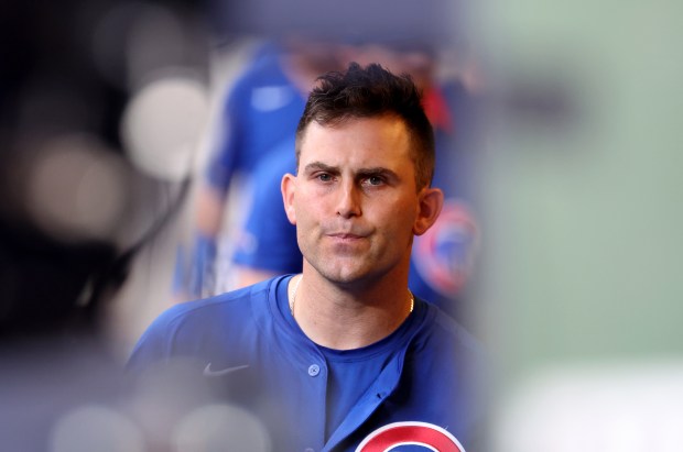 Cubs starter Matthew Boyd walks through the dugout after being...