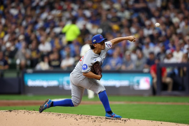 Shota Imanaga pitches during the first inning against the Brewers...