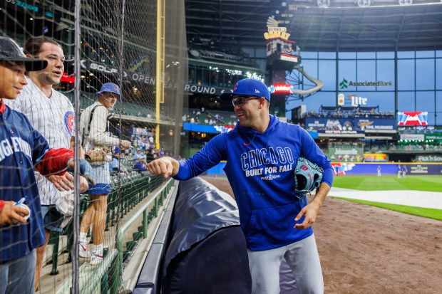 Chicago Cubs pitcher Matthew Boyd talks with fans before the...