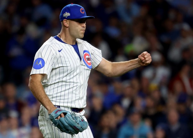 Cubs starting pitcher Matthew Boyd celebrates after closing out the...