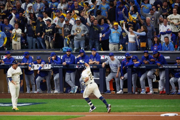 Brewers' Andrew Vaughn rounds the bases after hitting a solo...