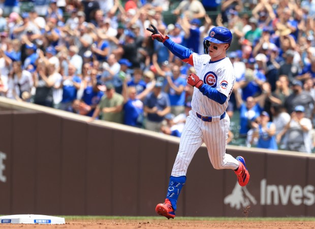 Pete Crow-Armstrong rounds the bases after hitting a two-run home run against the Brewers in the first inning at Wrigley Field on June 19, 2025. (John J. Kim/Chicago Tribune)