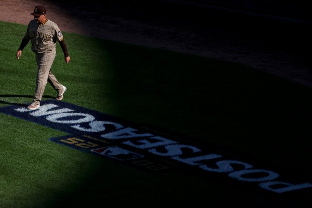 Ruben Niebla #57 of the San Diego Padres walks on the field during during the sixth inning of game one of the NL Wild Card Series against the Chicago Cubs at Wrigley Field on Tuesday, Sept. 30, 2025 in Chicago, Illinois. (Meg McLaughlin / The San Diego Union-Tribune)