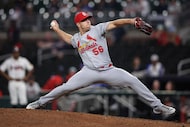 St. Louis Cardinals pitcher Ryan Helsley (56) delivers in the ninth inning of a baseball...
