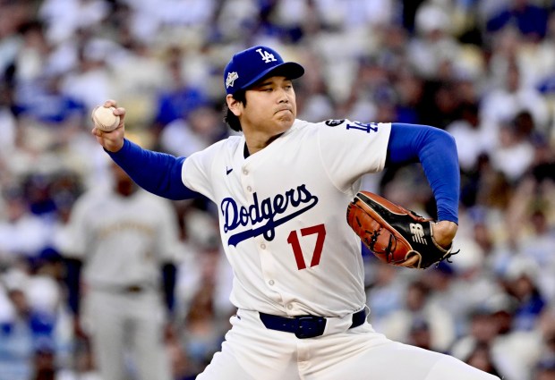 Dodgers starting pitcher Shohei Ohtani throws to the plate during the first inning of Game 4 of the National League Championship Series against the Milwaukee Brewers on Friday night at Dodger Stadium. (Photo by Keith Birmingham, Pasadena Star-News/SCNG)