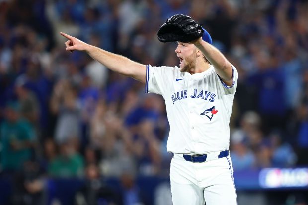 Trey Yesavage #39 of the Toronto Blue Jays celebrates after...