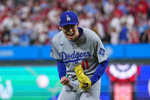 Los Angeles Dodgers pitcher Roki Sasaki reacts after the Dodgers defeated the Philadelphia Phillies in Game 1 of baseball